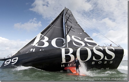Pictures of Alex Thomson (GBR) standing on the keel of his IMOCA Open 60 "Hugo Boss". Solent UK  Credit all pictures:Lloyd Images.